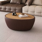 Table basse en cuir en forme d'œuf d'oie avec plateau en pierre frittée et motif unique